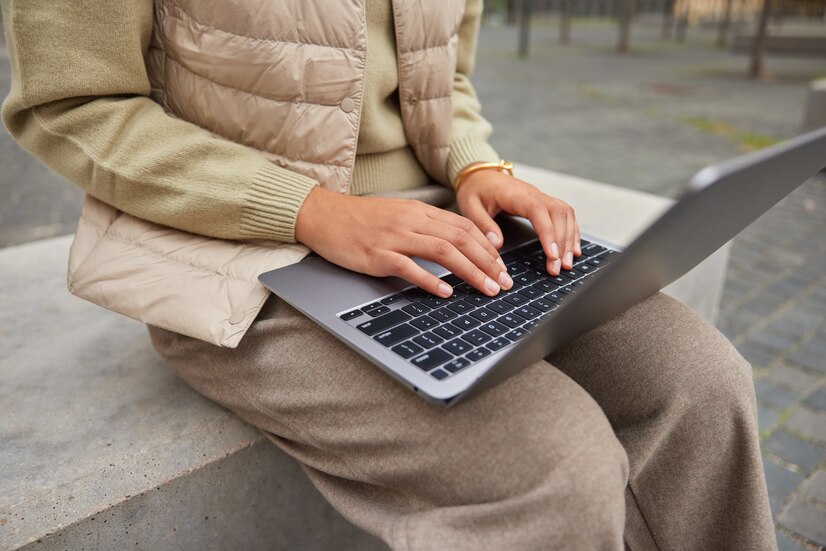cropped shot unrecognizable female blogger types text publication portable laptop computer works remotely outdoors dressed casual clothes keyboards modern device prepares exams 273609 55224