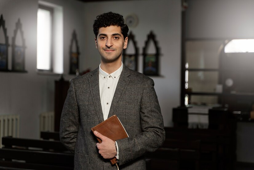 medium shot young pastor holding bible 23 2149366618 1