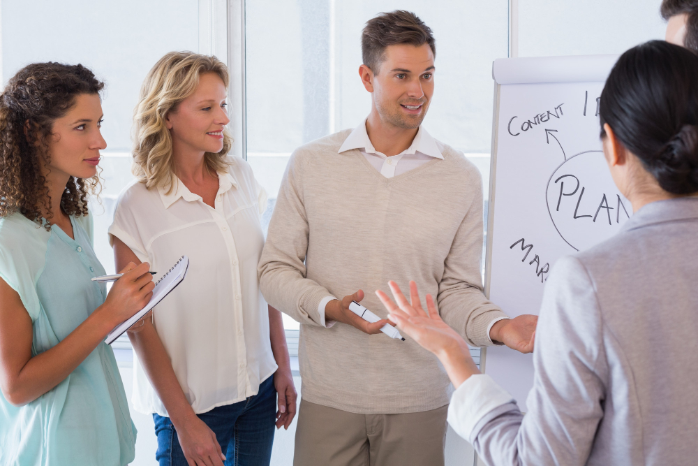 casual businessman giving presentation colleagues