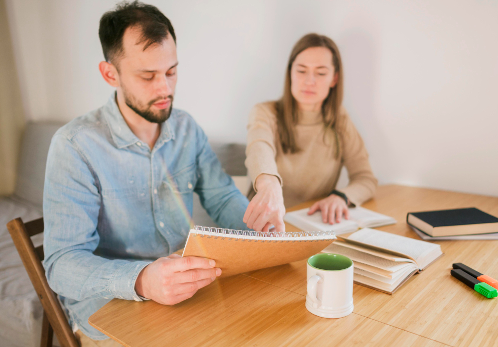 woman teaching man home